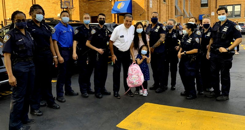 ‘Miracle’ daughter born two years after her father’s death is escorted by NYPD to her first day of school