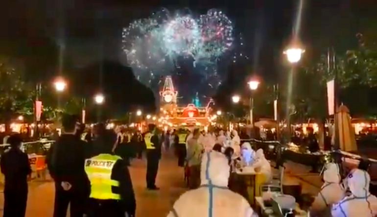 34,000 visitors trapped at Shanghai Disneyland for hours after a woman tested positive for COVID-19