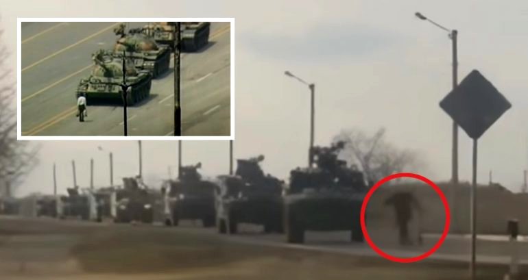 Ukrainians filmed attempting to block Russian tanks sparks comparisons to Tank Man of Tiananmen Square