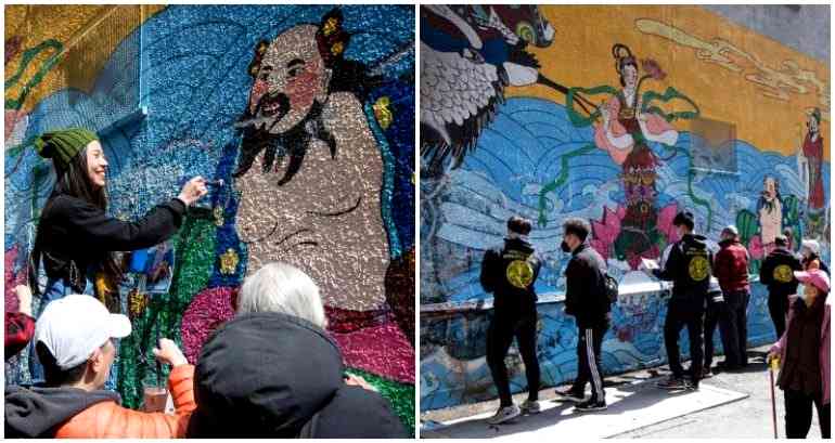 Community members show up to restore defaced ‘8 Immortals’ mural in Vancouver’s Chinatown