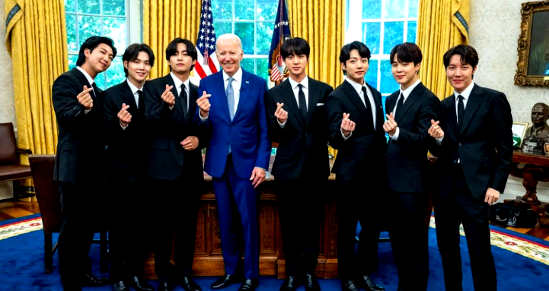 Netizens react to President Biden posing with a finger heart for Oval Office photo with BTS