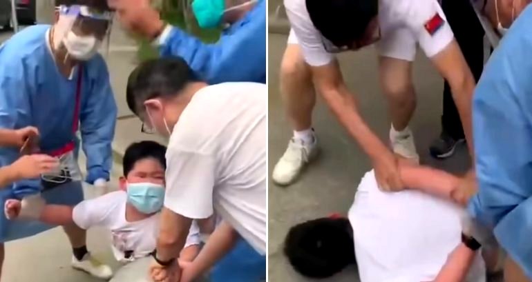 10-year-old boy filmed threatening to stab Shanghai health worker with knife during COVID test
