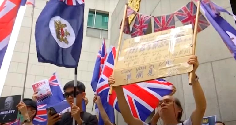 Journalist jailed for waving British-Hong Kong flag during China national anthem