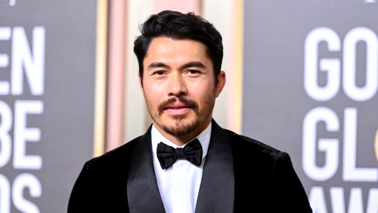 Henry Golding shuts down rumors that he is in the running to be James Bond