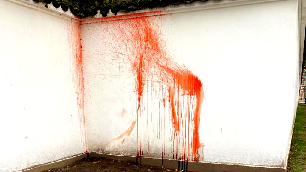 Men in clown wigs splatter fake blood onto walls of Vancouver’s Chinese garden