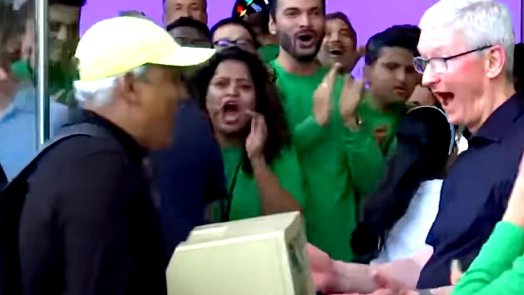 Apple CEO attends first store opening in India, surprised by fan carrying 1984 Mac