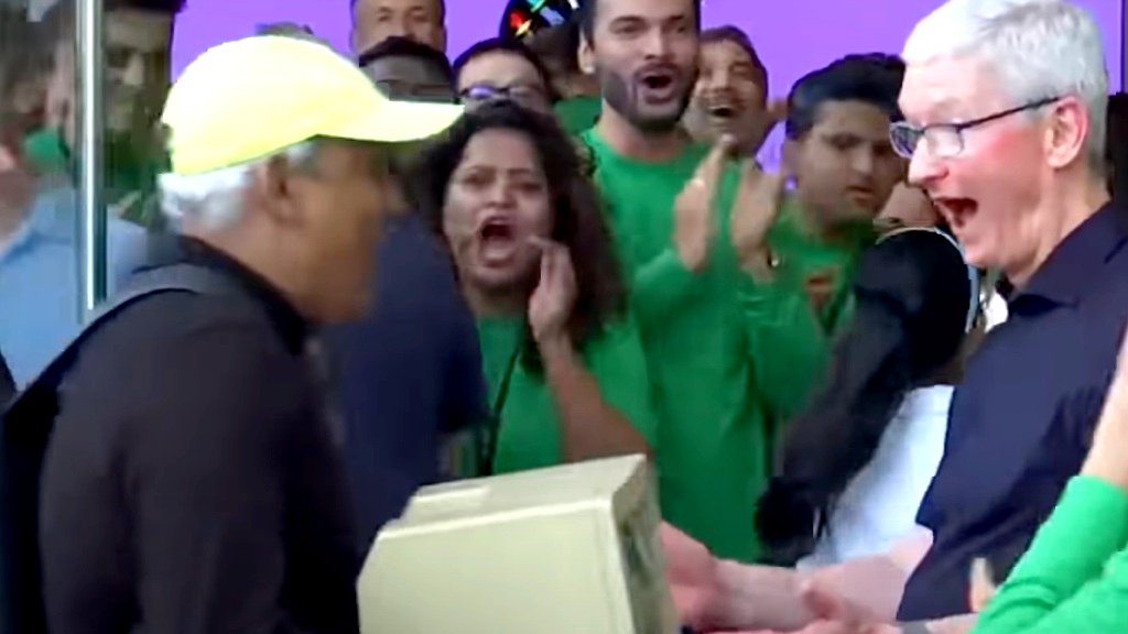 Apple CEO attends first store opening in India, surprised by fan carrying 1984 Mac