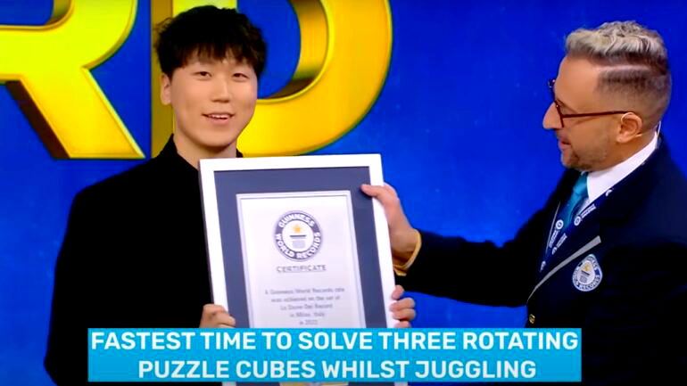 Chinese man solves 3 Rubik’s Cubes while juggling them, breaks world record