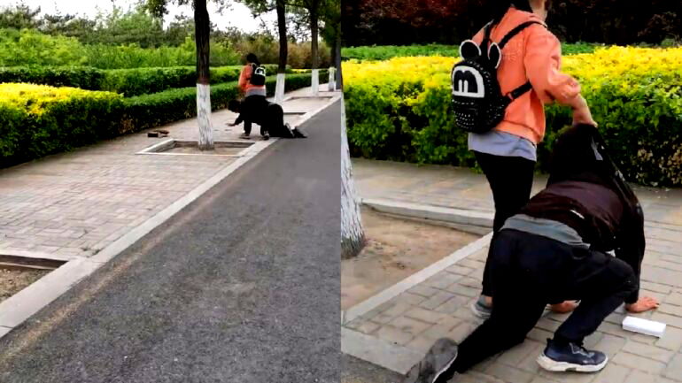 Watch: Chinese dad kneels in public for being unable to buy daughter an iPhone